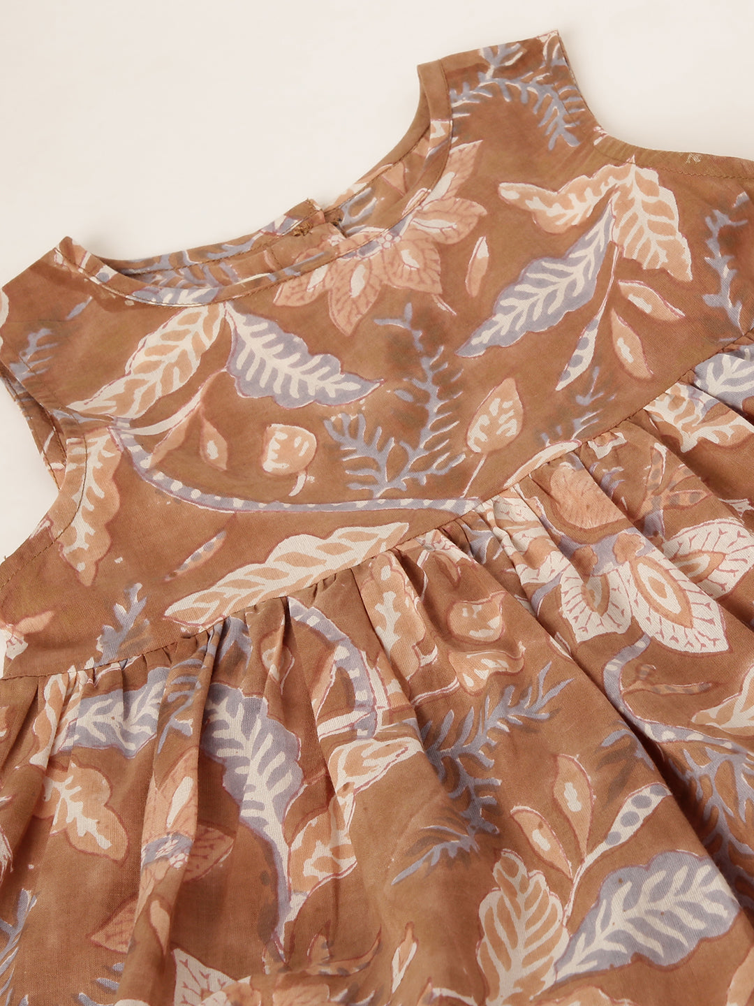 Girls sleeveless dress with Brown and lavender block print. Ages 1-8 years